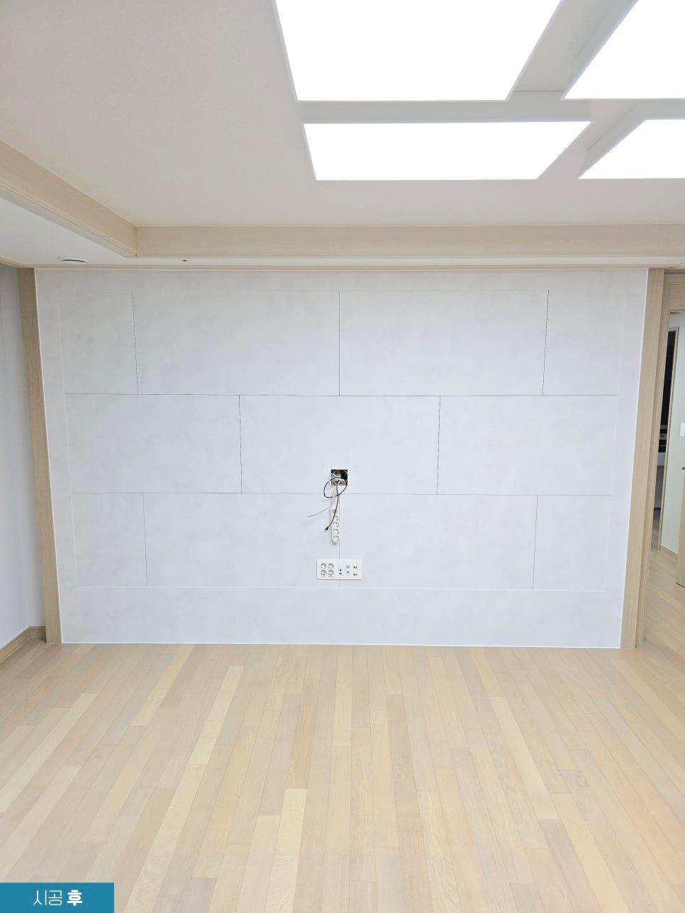 발렌블랑 필름으로 정돈된 아트월 벽면