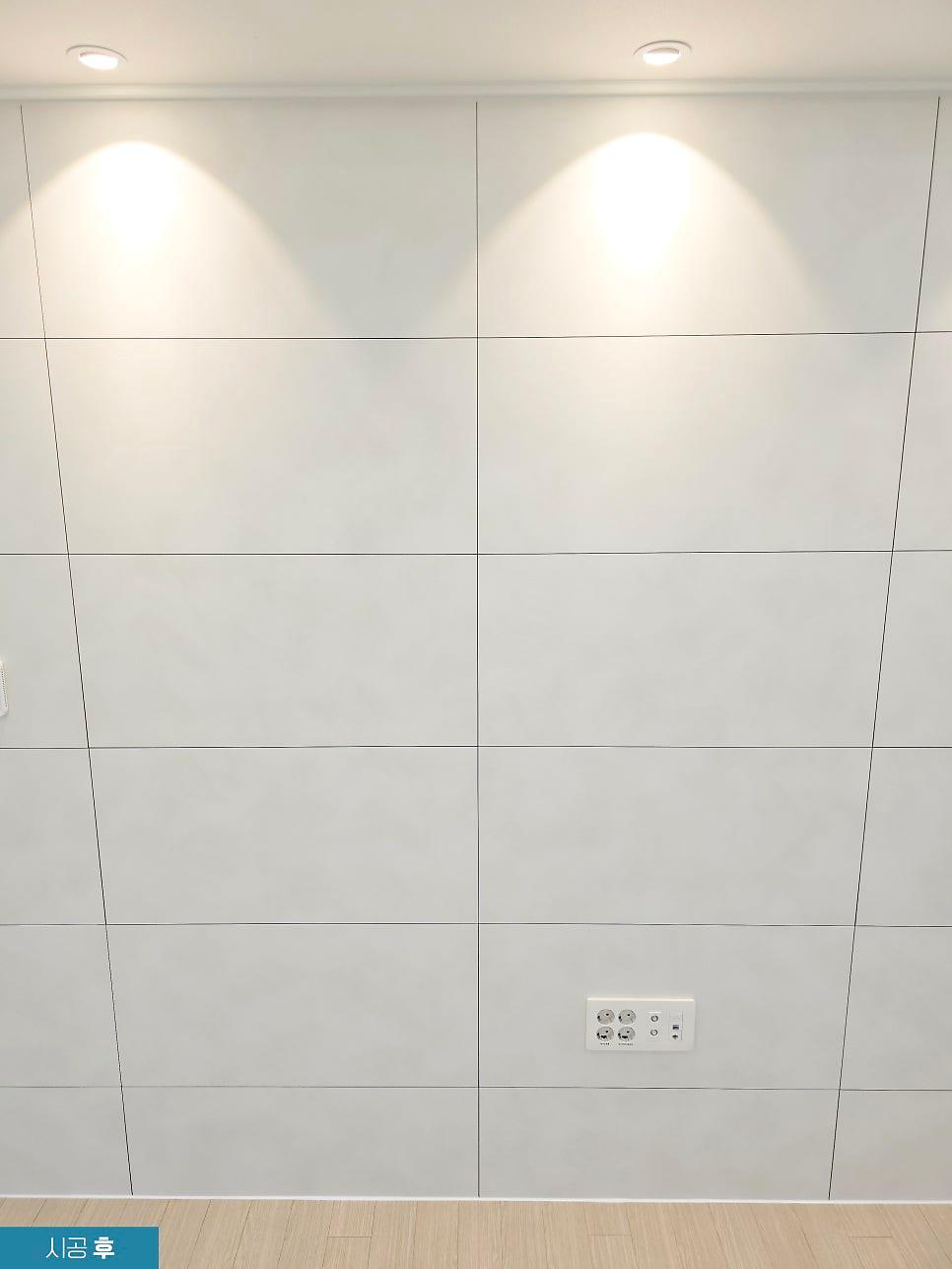 타일 한 장씩 재단하여 시공한 아트월 벽면