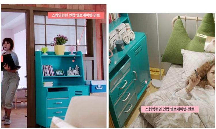 청록색 수납장과 소품이 배치된 창가 공간